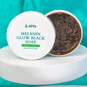 Melanin black soap skincare product in a jar, promoting healthy skin with natural ingredients for cleansing and rejuvenation.