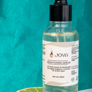 Brightening serum in a bottle, formulated with alpha arbutin for enhanced skin radiance and clarity